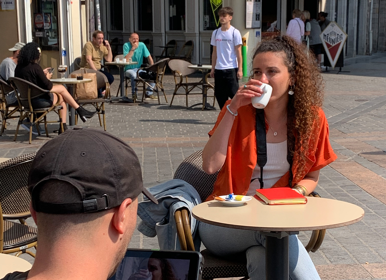 Image of a woman drinking coffee